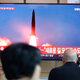 South Koreans watch footage of a North Korean missile test, August 6th 2019.